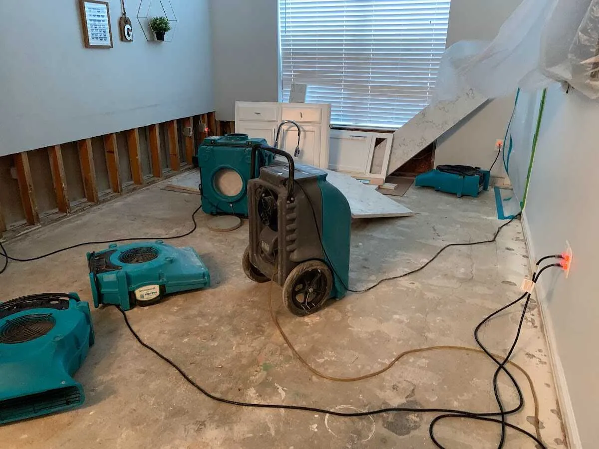 Dehumidifier in flood-cut room for Water Damage Restoration in Champaign